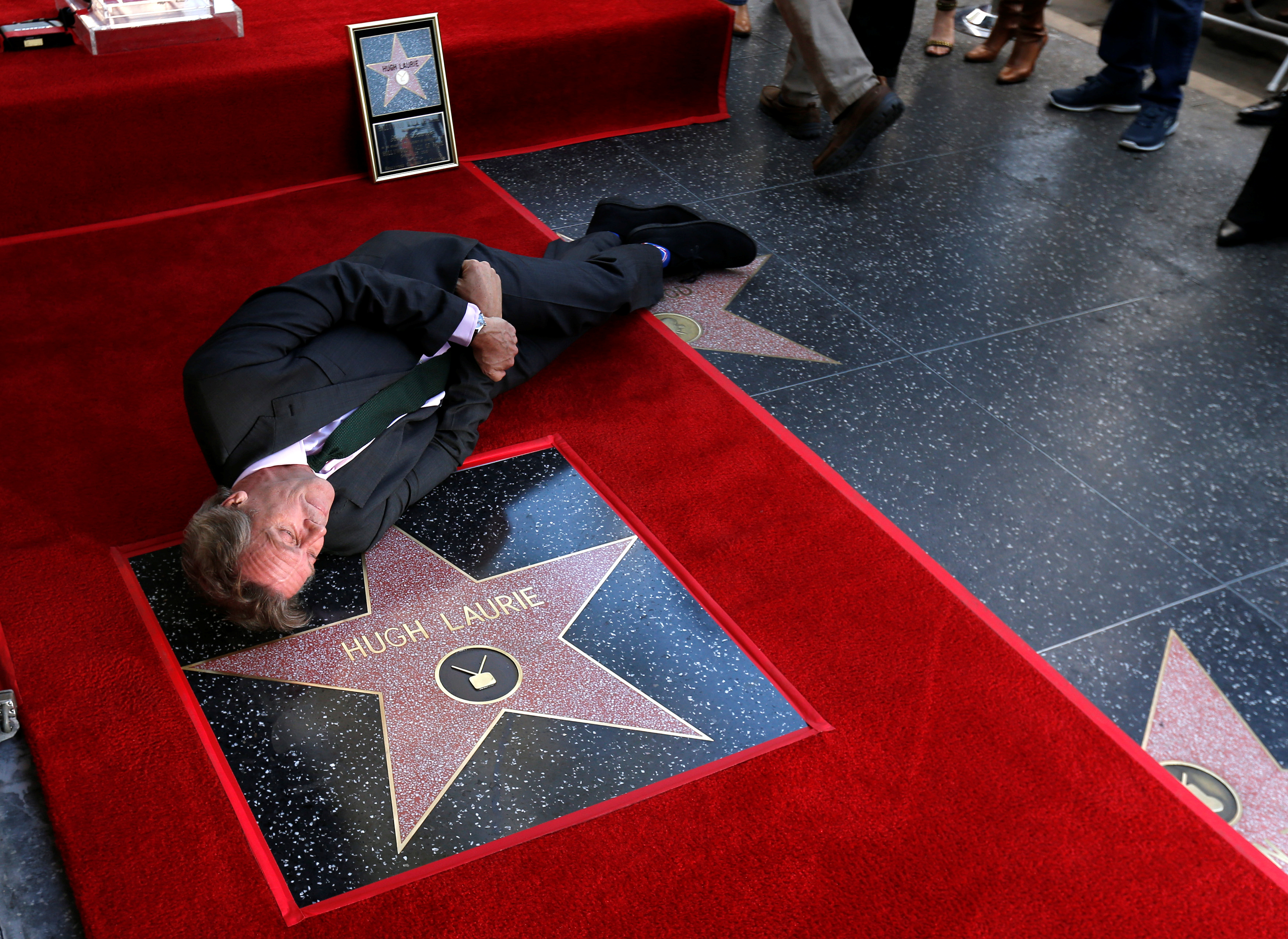 Какие звезды на аллее славы. Голливудская «аллея славы» Лос-Анджелес. Звезды на голливудской аллее славы. Звезда на аллее славы в Голливуде. Хью Лори звезда на аллее славы.