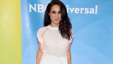 Защо Меган Маркъл обожава да носи твърде дълги панталони и рокли