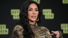 Мокра, прозрачна рокля и сексапилно боди – новата фотосесия на Ким Кардашян