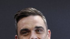 Бебето на Роби Уилямс повръща от песните му