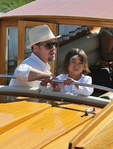 Пакс Тиен е сред петте най-сладки дечица. Баща му - сред мъжете. Снимки: Gettyimages/ Guliver