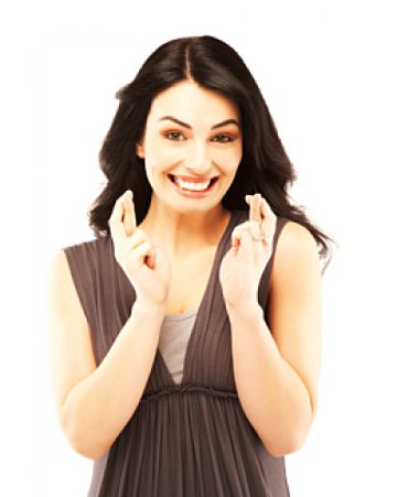 Стискането на палци срещу бебе също е много популярно. Не, не помага. Снимка: Dreamstime