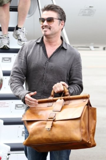 Джордж на летището в Сидни. Снимка: Getty Images. Guliver