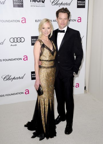 Ан Хечи и Джеймс Тъпър; Снимка: Reuters