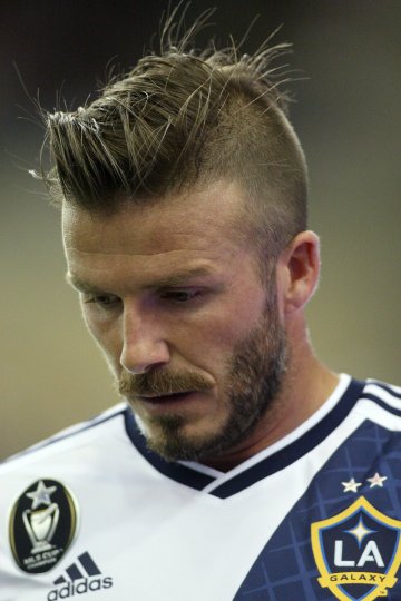 Дейвид Бекъм с една от прическите му, която се превърна в тотакен хит...дори и сред жените. Снимка: Getty Images/Guliver