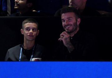 Ромео с баща си Дейвид Бекъм. Снимка: Reuters