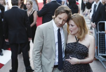 Бивши колеги, настоящи влюбени? Снимка: Reuters