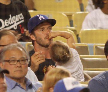 Дейвид и Харпър Бекъм; Снимка: Spalsh News