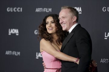 Салма Хайек със съпруга си Франсоа Анри Пино. Снимка: Reuters