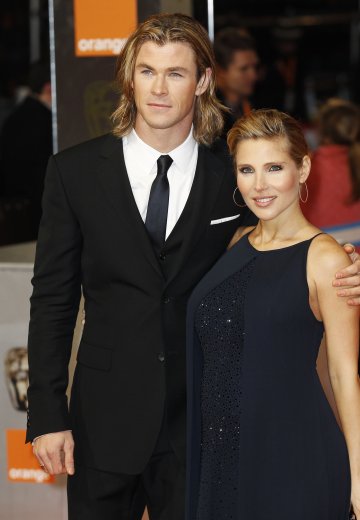 Крис Хемсуърт и съпругата му; Снимка: Reuters