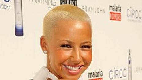 Котешки сексапил с кехлибарени оттенъци. Или Амбър Роуз