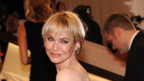 Семейни работи. Рене Зелуегър снима с гаджето си