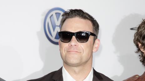 Роби Уилямс учи чуждо дете да псува