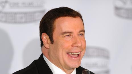 Траволта играе с жена си, Линдзи обратно в играта