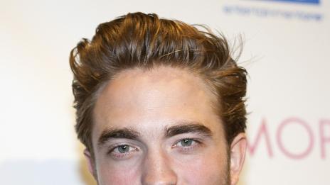 Патинсън отказва цигарите с помощта на Ди Каприо