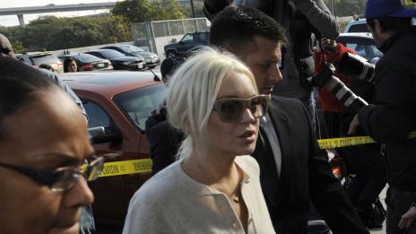 Линдзи викна полиция заради потропване на вратата