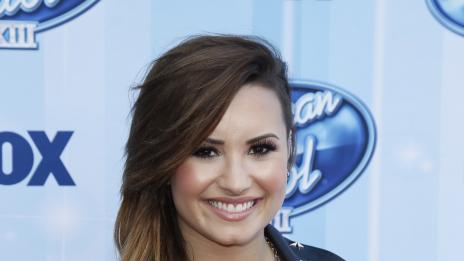 Деми Ловато си пада по Амбър Хърд