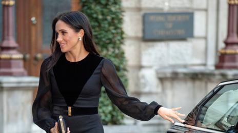Не претендира да е принцеса: Меган сама затвори вратата на колата