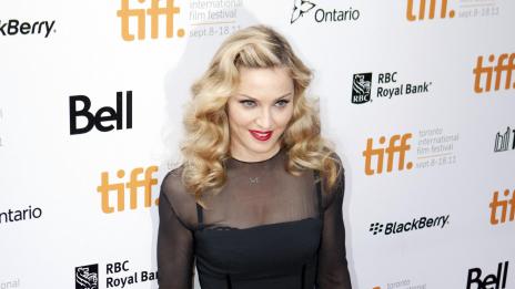 Мадона пее на Super Bowl  вместо Гага