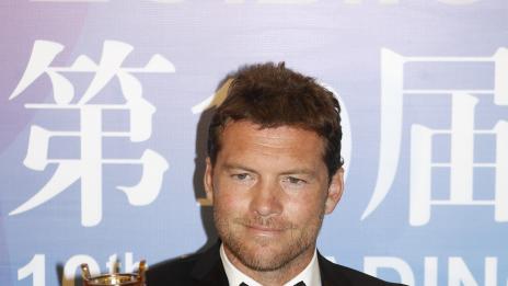 Арестуваха Сам Уортингтън след спречкване с фотограф