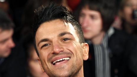 Питър Андре не показвал гаджето си заради децата