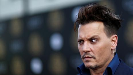 Джони се опъна на Амбър. Не иска да ѝ плати $ 6,8 милиона