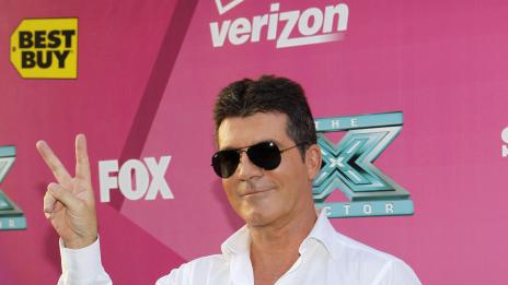 Саймън Коуел призна, че излиза с Кармен Електра