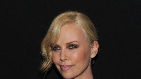 Загаджиха Райън и Чарлийз Терон