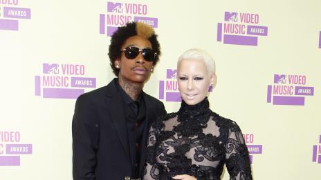 Уиз Калифа призна за аборта на Амбър