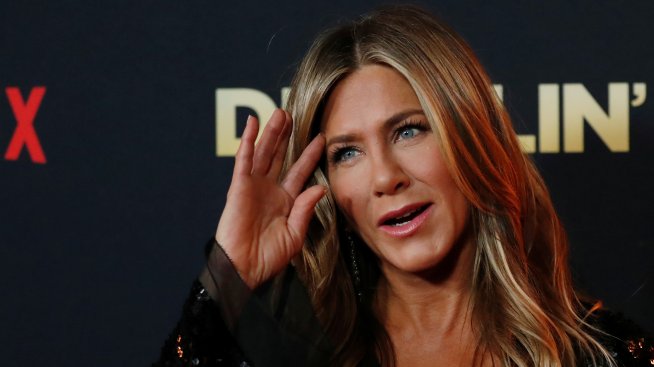 Иии наградата за снимката на деня отива при... Дженифър Анистън