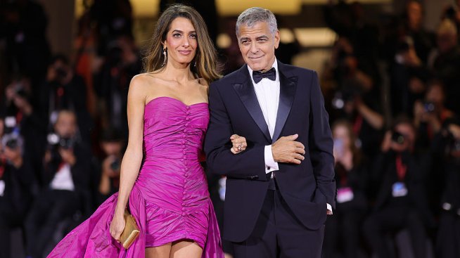 С подкрепата на Амал - Джордж Клуни се появи болен на червения килим във Венеция
