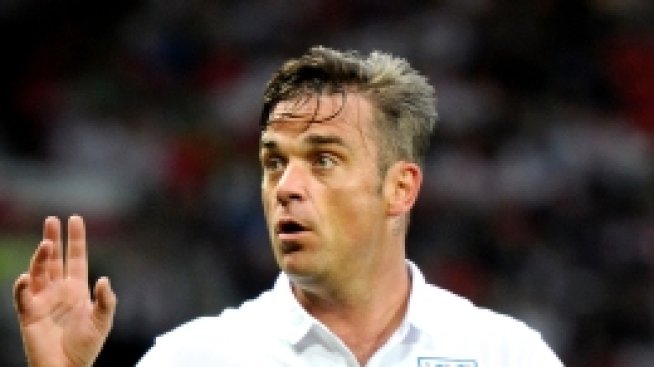 Е, браво! Годеницата на Роби Уилямс го заряза заради Световното