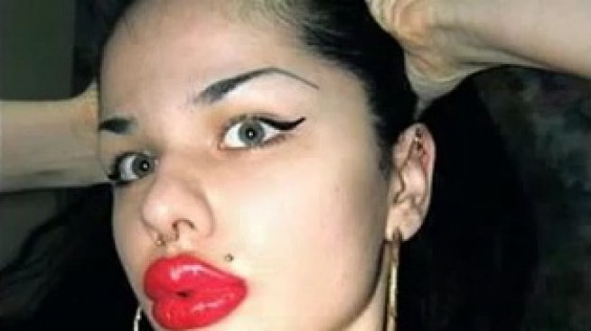 Чар или гротеска: жената с най-големи устни в света (Видео)