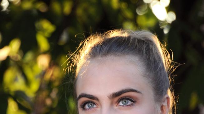 Кара Делевин рискува модната си кариера заради татуировките си