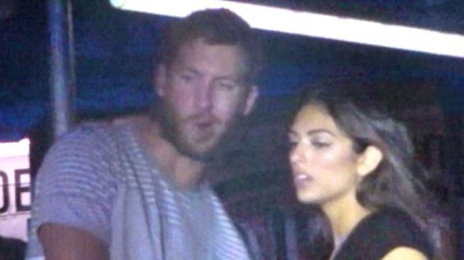 Тейлър коя? Калвин Харис се закача с красива брюнетка