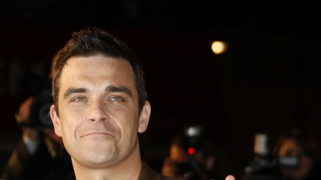 Роби Уилямс купи картина на неродената си дъщеря