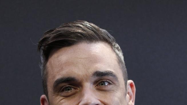 Роби не би отказал секс с Мила Кунис