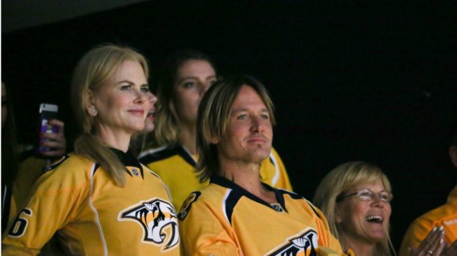 Никол Кидман и Кийт Ърбан като спортни фенове