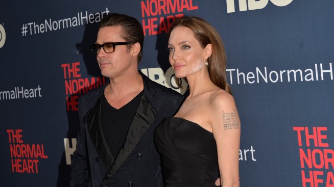 Анджелина Джоли се появи на червения килим омазана с пудра