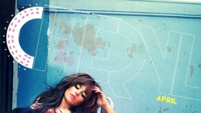 Черил Коул гали страховит доберман в своя нов календар