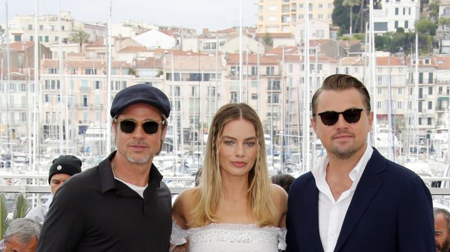 Брад Пит и Марго Роби в закачка с Леонардо ди Каприо