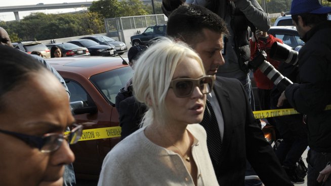 Линдзи викна полиция заради потропване на вратата