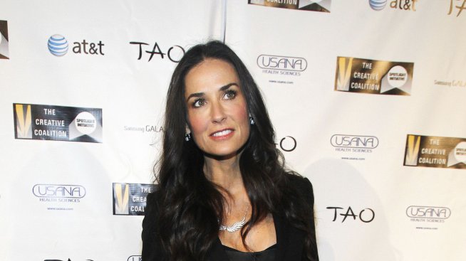 Деми била бисексуална и с Аштън имали отворена връзка