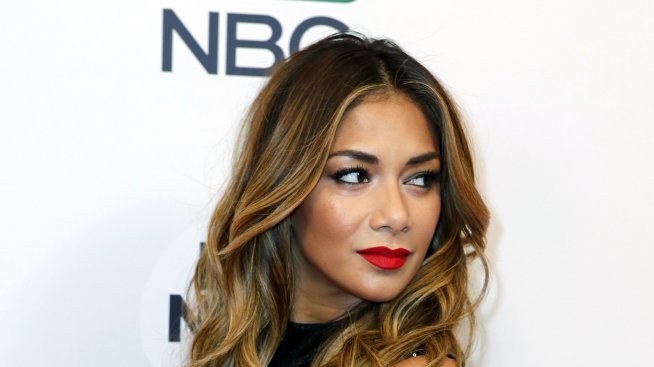 Никол Шерцингер страда за Люис Хамилтън