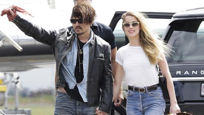 Джони Деп дава месечна издръжка на Амбър Хърд