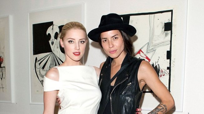 Хърд сключила брак с фотографка преди връзката ѝ с Деп