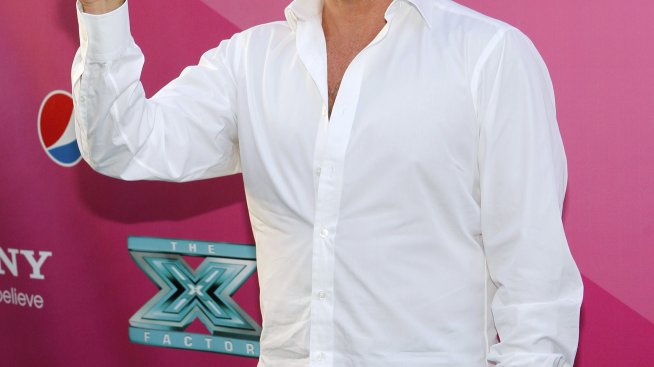 Саймън Коуел призна, че излиза с Кармен Електра