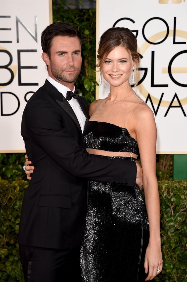 Адам Лавин от Maroon 5 и жена му - топомделът Бехати Принсло; Снимка; Getty Images