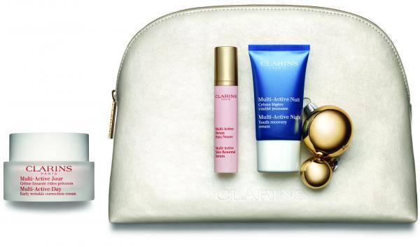 Коледен комплект с превантивна грижа – антиейдж крем Multi-Active Day, серум Multi-Active Skin Renewal Serum, нощен възстановяващ крем Multi-Active Night (Clarins, 119 лв.)