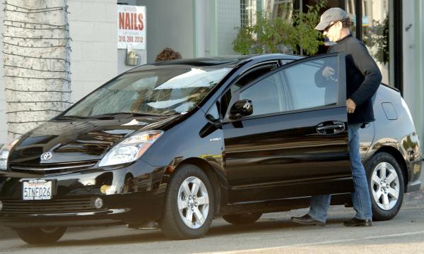 Том Хнакс караше Hybrid Toyota Prius; Снимка; Splash News